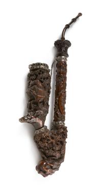 A Black Forest Carved Pipe, Height overall 14 1/8 inches.