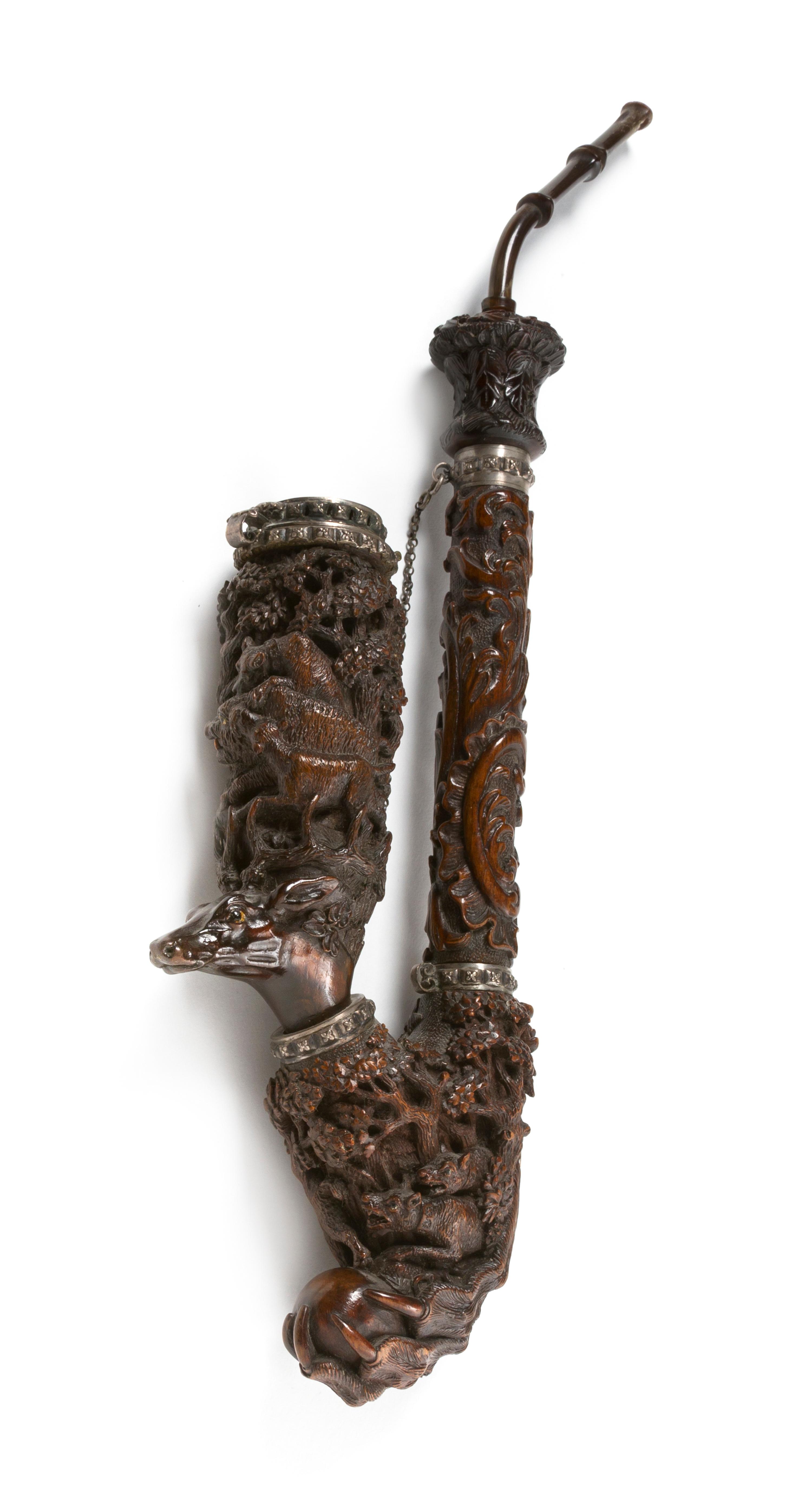 A Black Forest Carved Pipe, Height overall 14 1/8 inches.