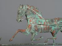 A Molded Copper and Cast Zinc Trotting Horse and Sulky Weathervane