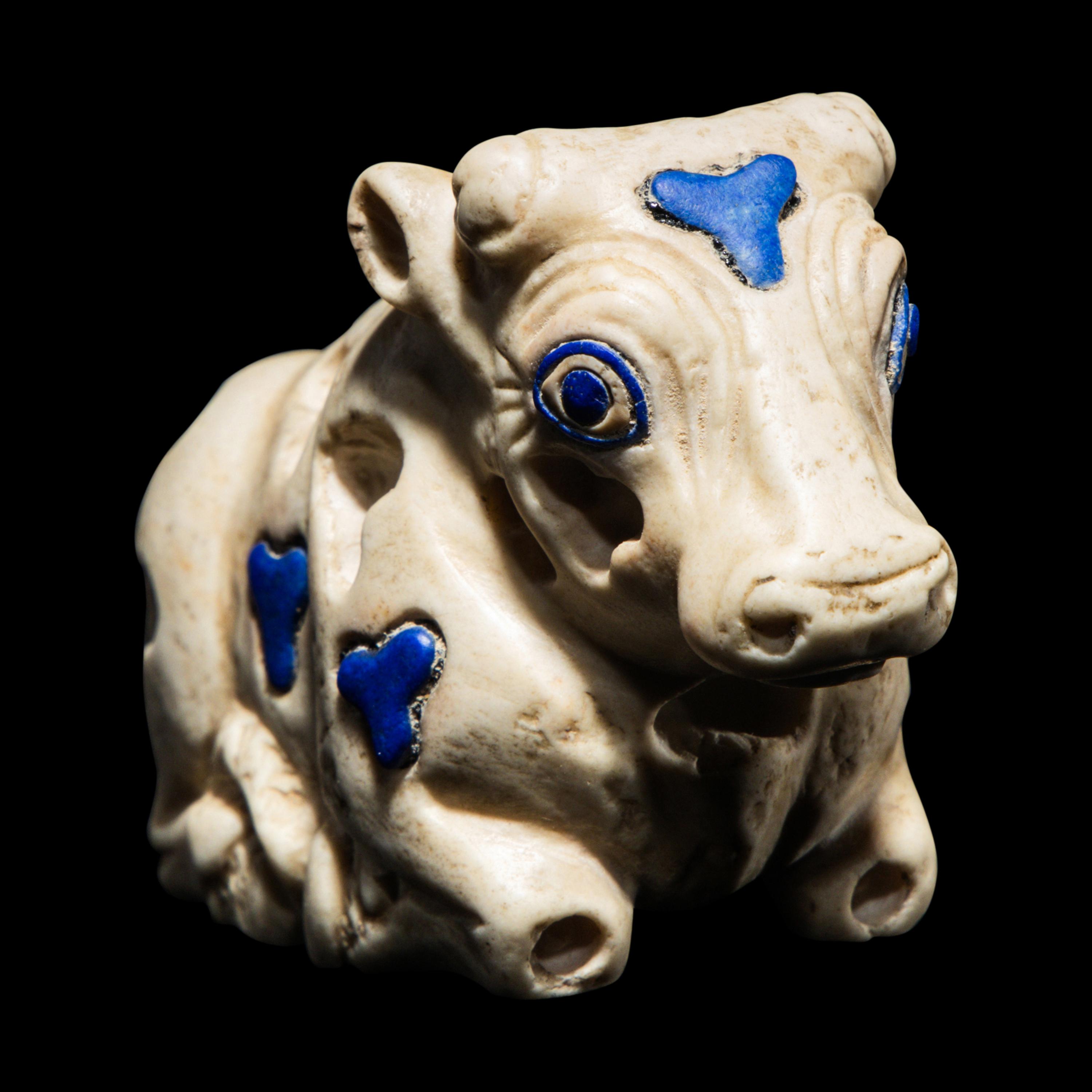 A Mesopotamian Marble and Lapis Lazuli Inlay Recumbent Calf