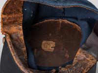 [CIVIL WAR]. Forage cap with contractor label featuring 104th regimental number and insignia.