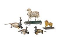 Five Pressed and Painted Tin Circus Animal Toys