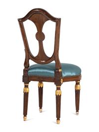 A Pair of Russian Neoclassical Parcel-Gilt Mahogany Side Chairs