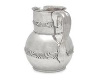 A Sterling Silver "Wave" Repousse Water Pitcher, Tiffany & Co., New York, NY, Circa 1880