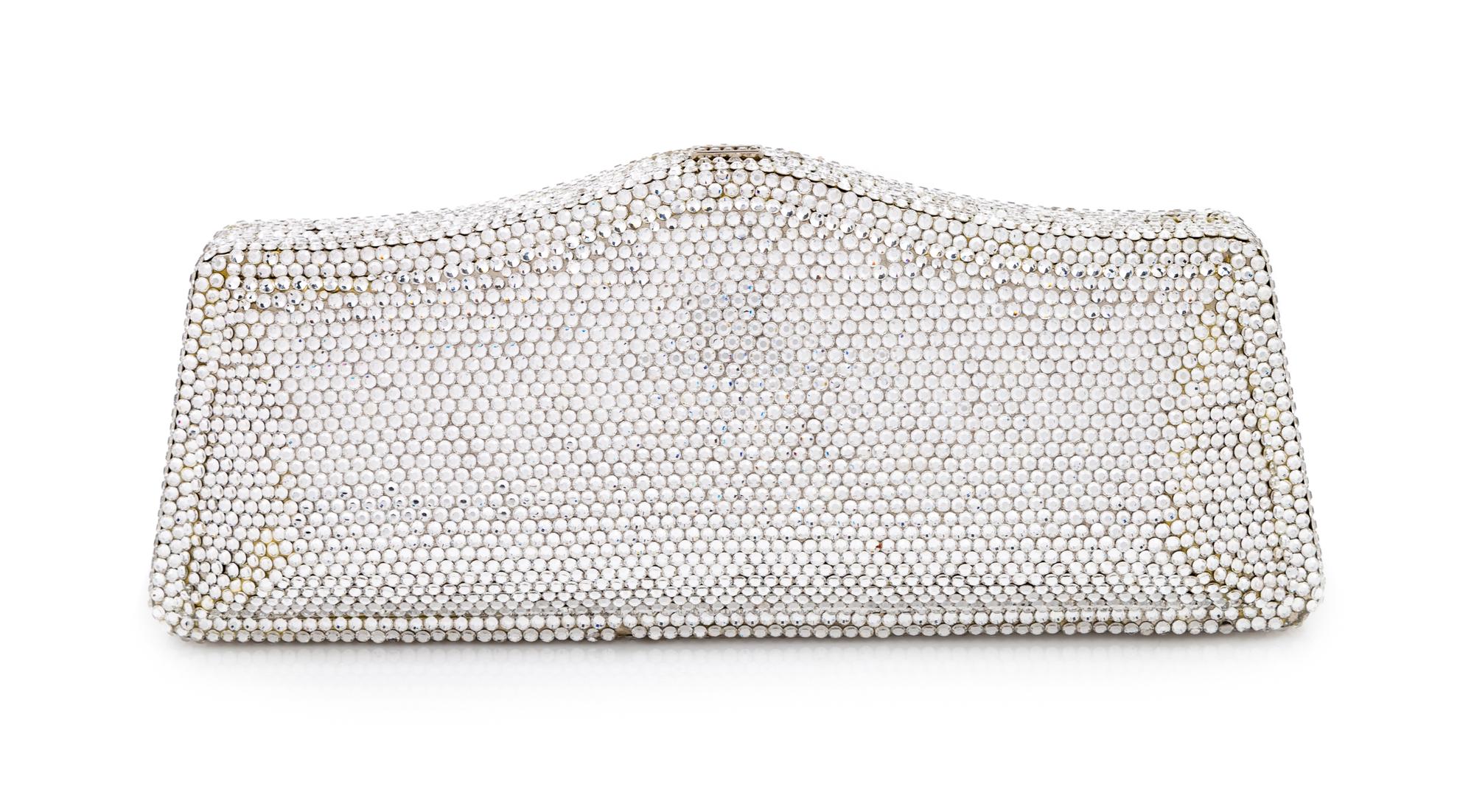 A Judith Leiber Silver Crystal Minaudiere, 3.5" H x 8" W x 1.25" D.
