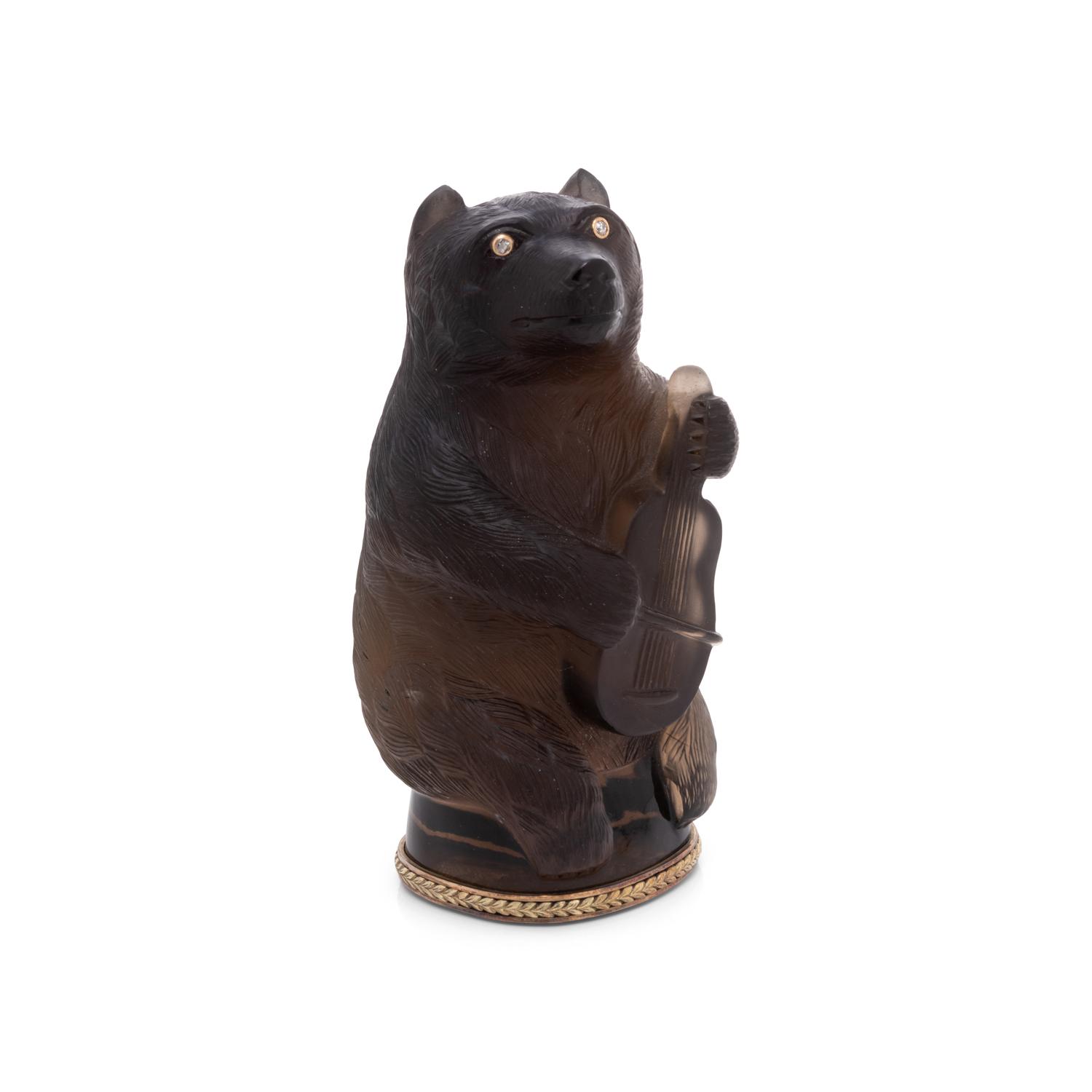 A Gold and Diamond Mounted Carved Hardstone Hand-Seal