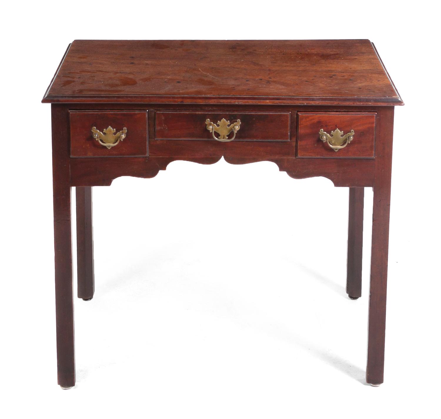 An English Mahogany Writing Table, Height 28 x width 31 x depth 19 inches.