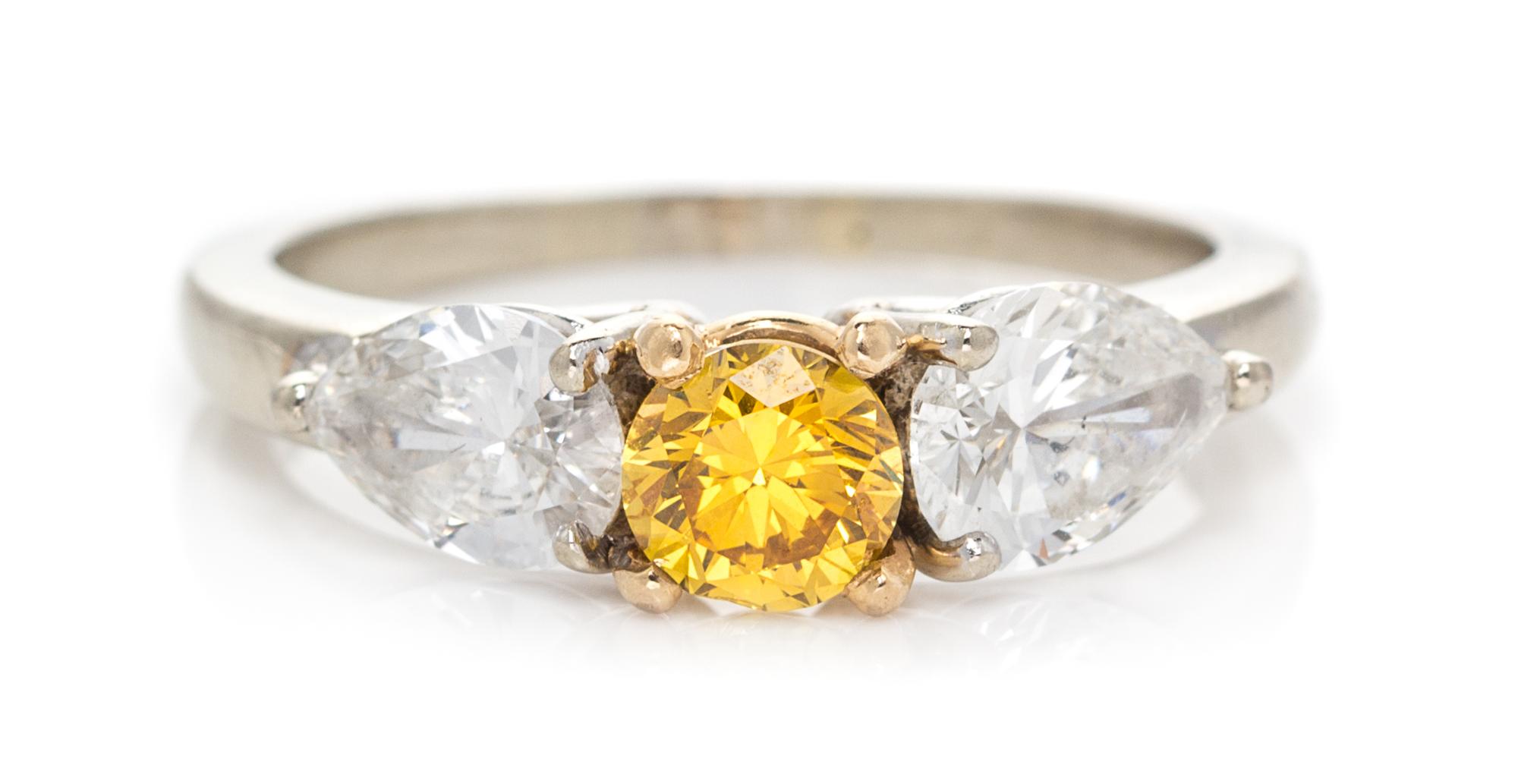A Bicolor Gold, Fancy Vivid Yellow Diamond and Diamond Ring, 2.30 dwts.