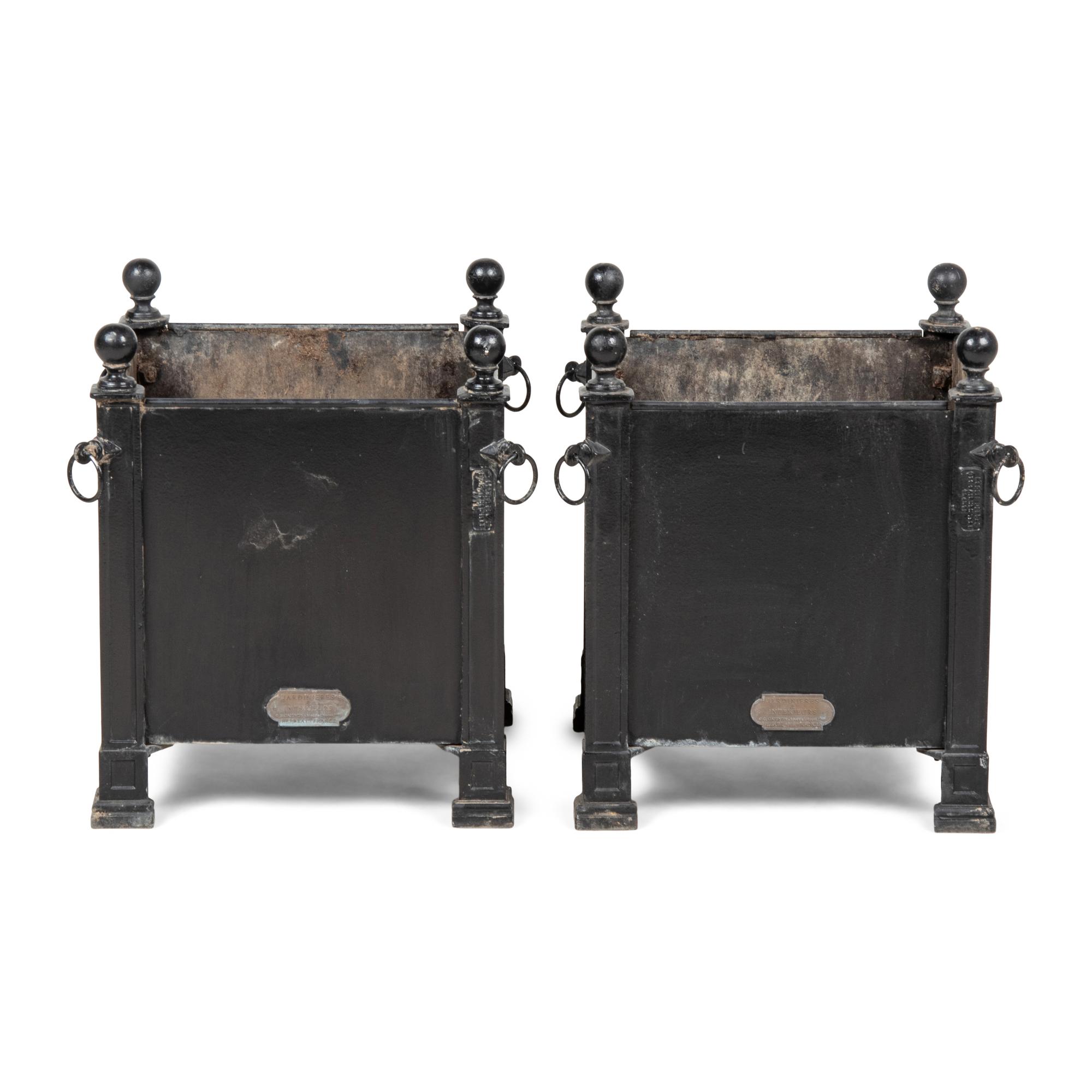 A Pair of Gaignon Black Enameled Metal Jardinières