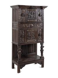 A Renaissance Style Carved Oak Cabinet