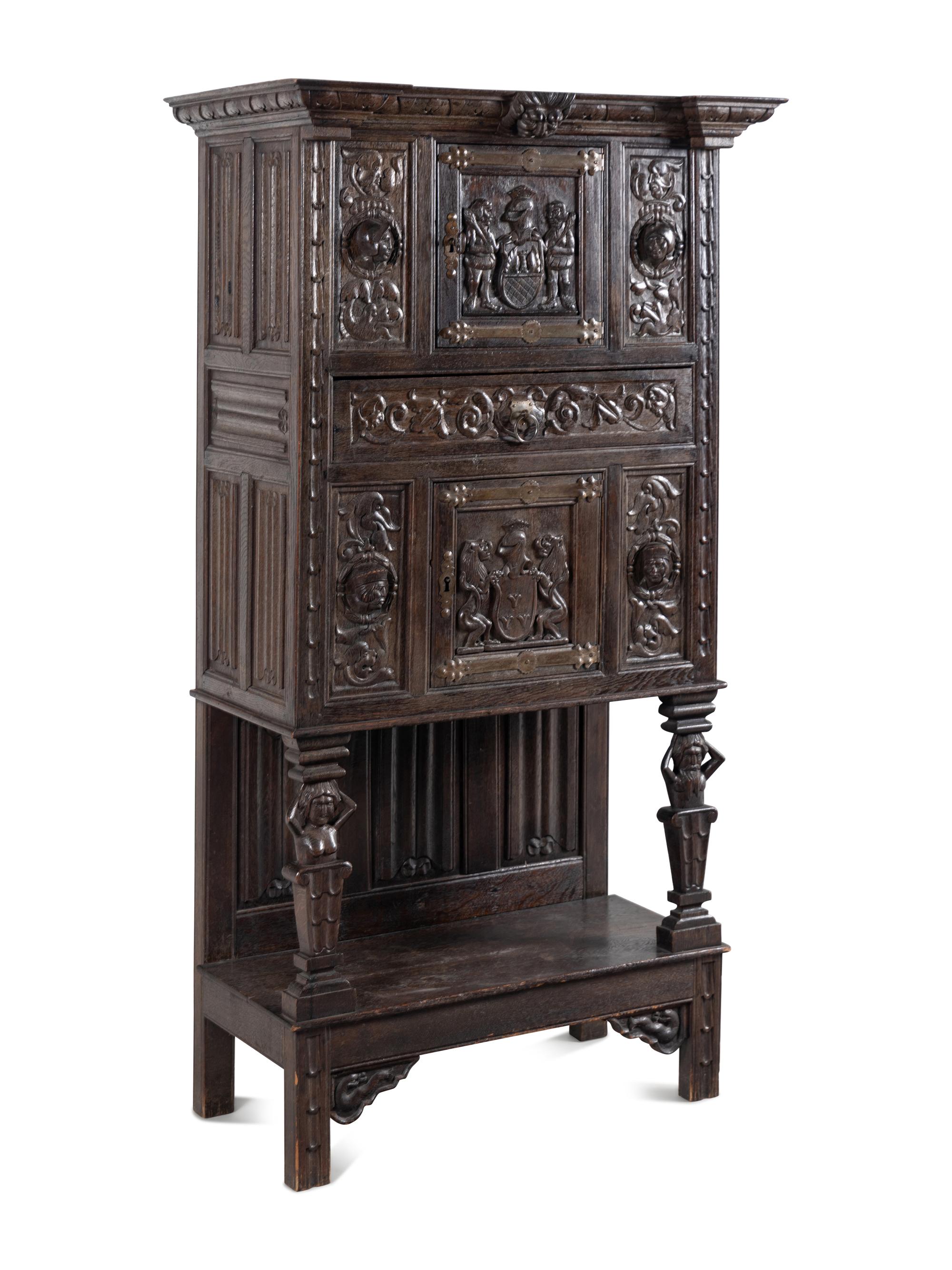 A Renaissance Style Carved Oak Cabinet