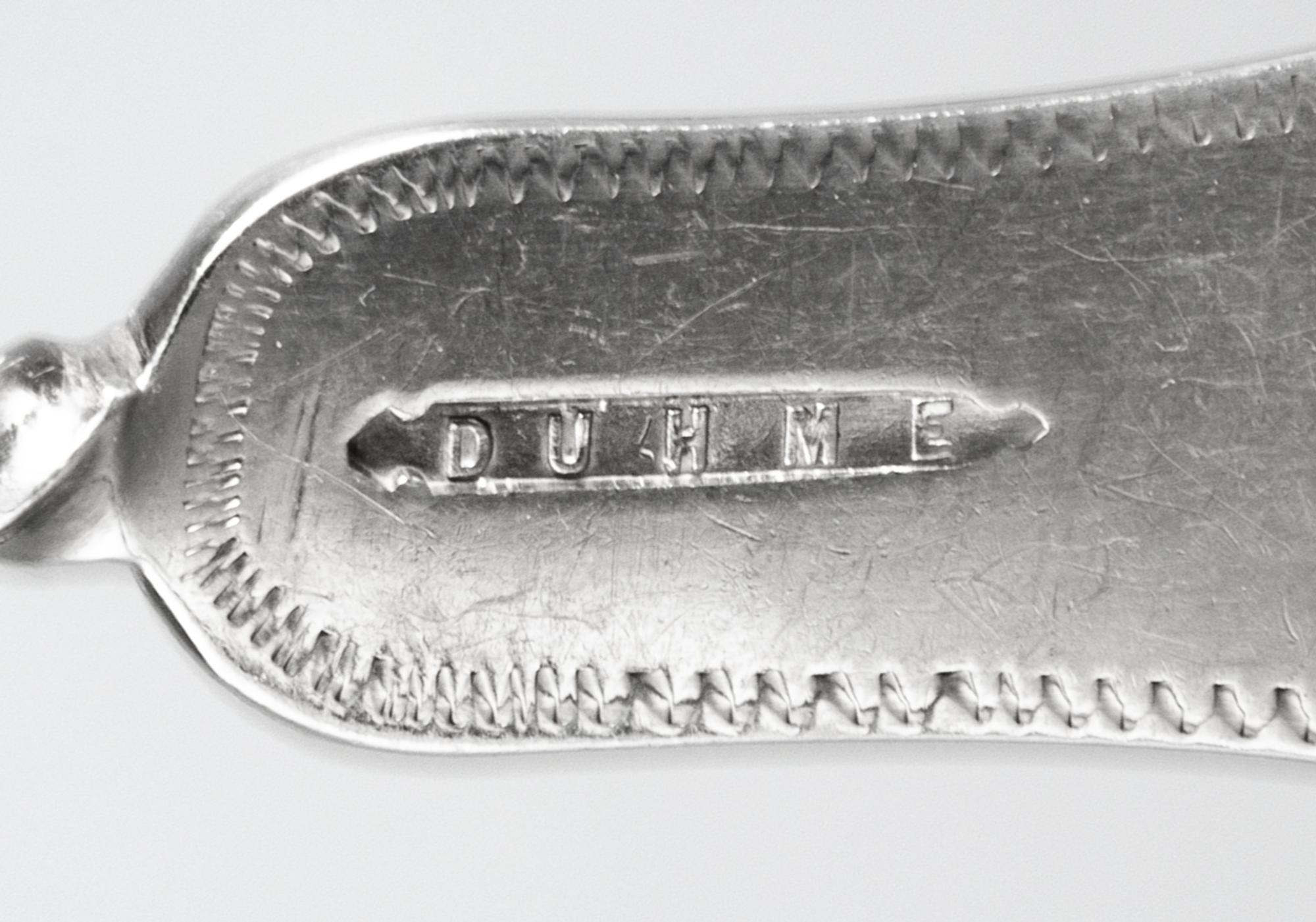 A Set of Twelve American Coin Silver Tablespoons, Duhme & Co., Cincinnati, 19th Century, each having a Fiddle pattern handle with spira