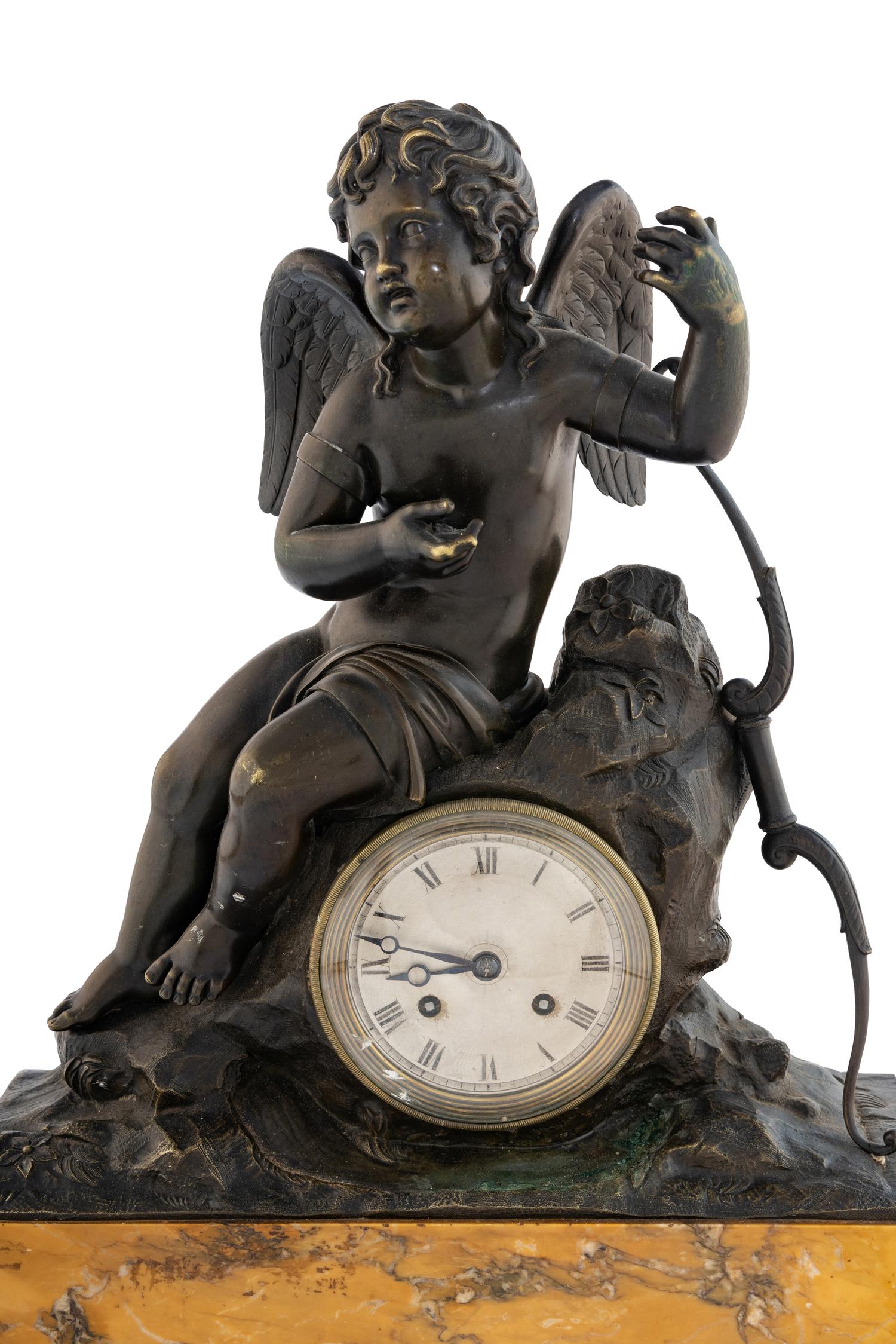 A Louis Philippe Bronze and Marble Figural Clock