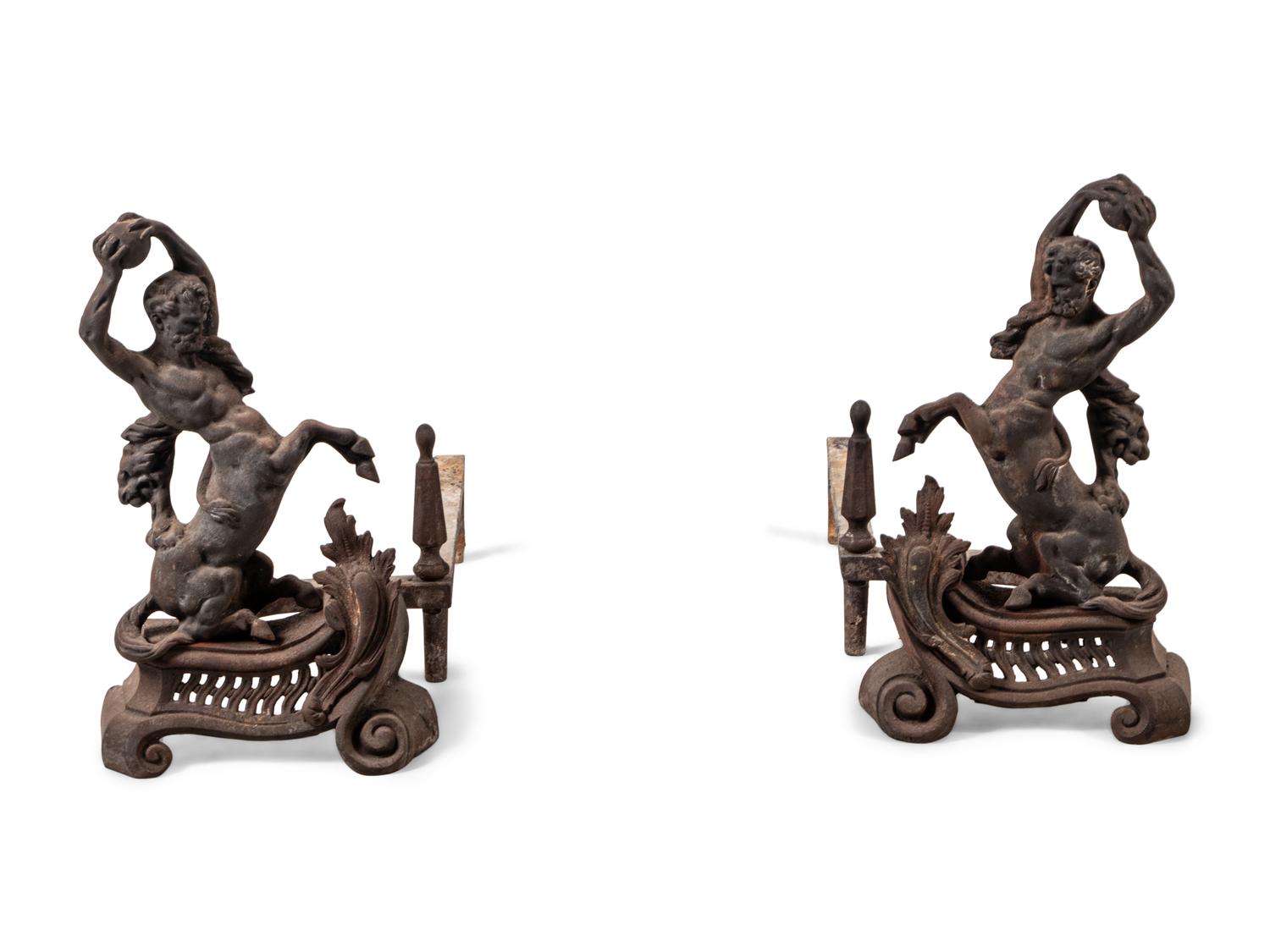 A Pair of Continental Iron Andirons with Hercules and the Nemean Lion