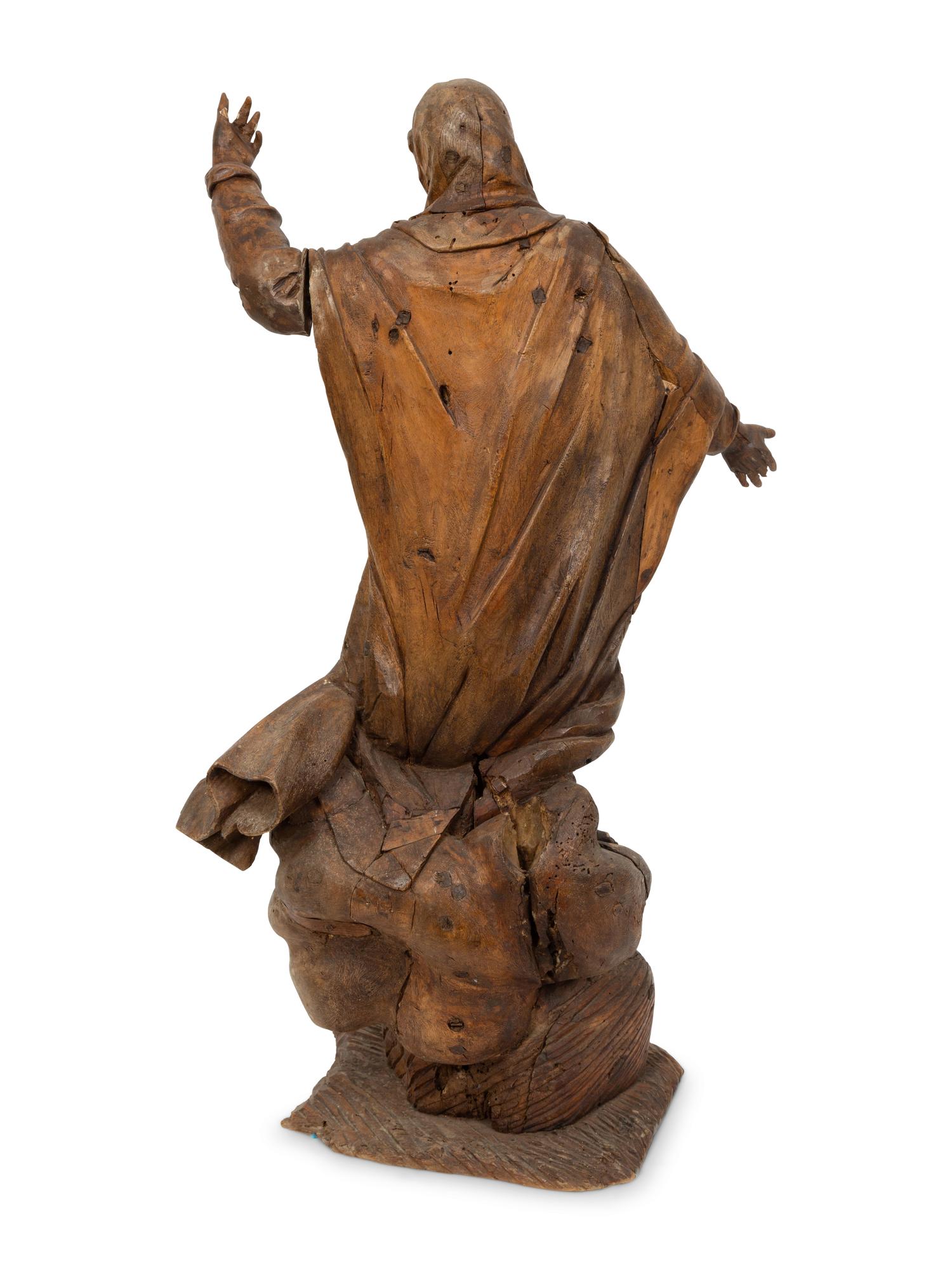 A Continental Carved Pine Figure of Female Saint
