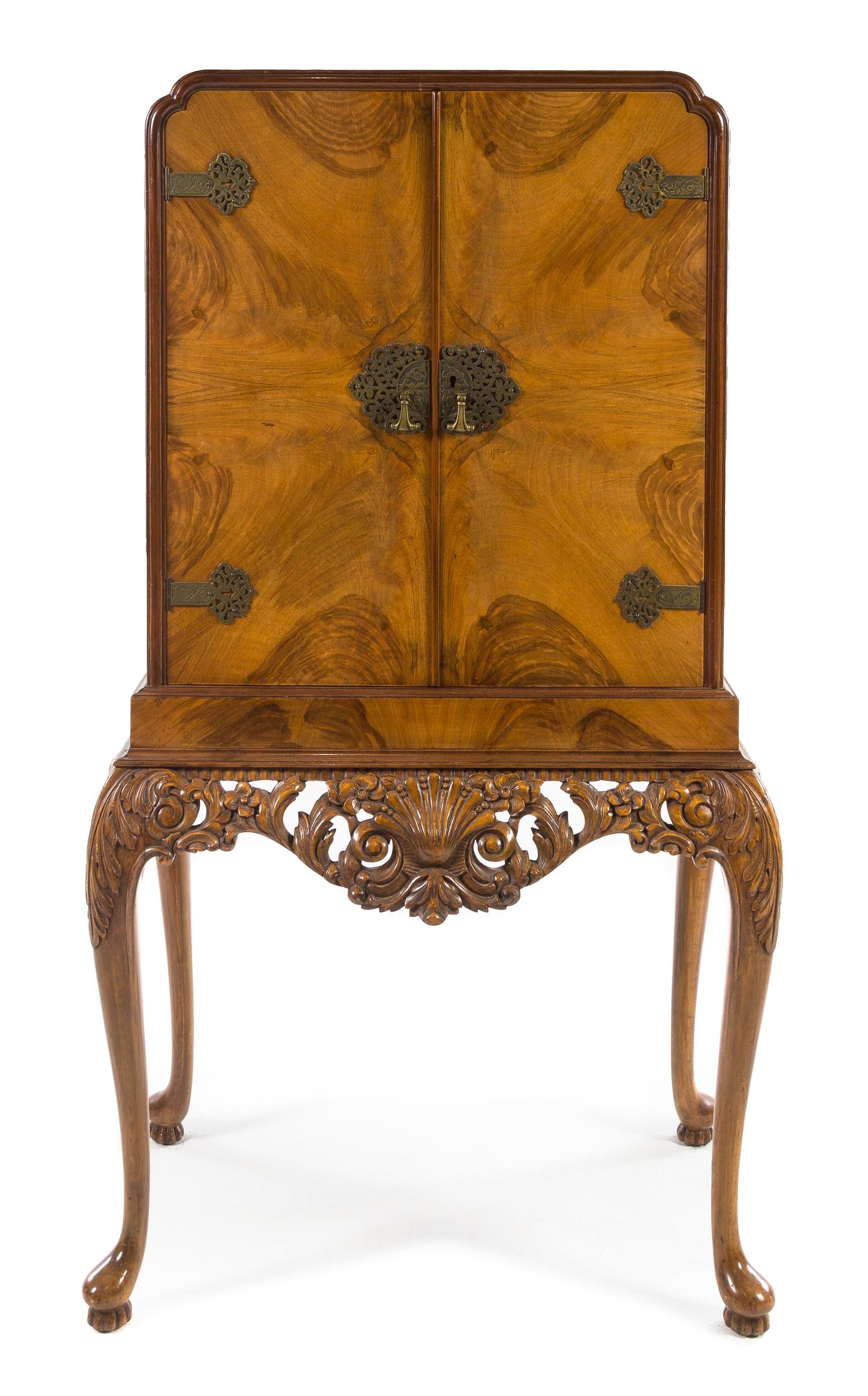 An Art Deco Burlwood Bar Cabinet Height 58 3/4 x width 32 x depth 20 3/4 inches. — CIRCA 1930s