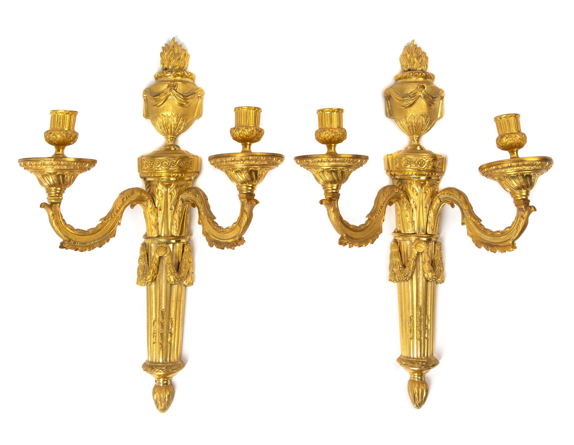 A Pair of Louis XVI Gilt Bronze Two-Light Sconces