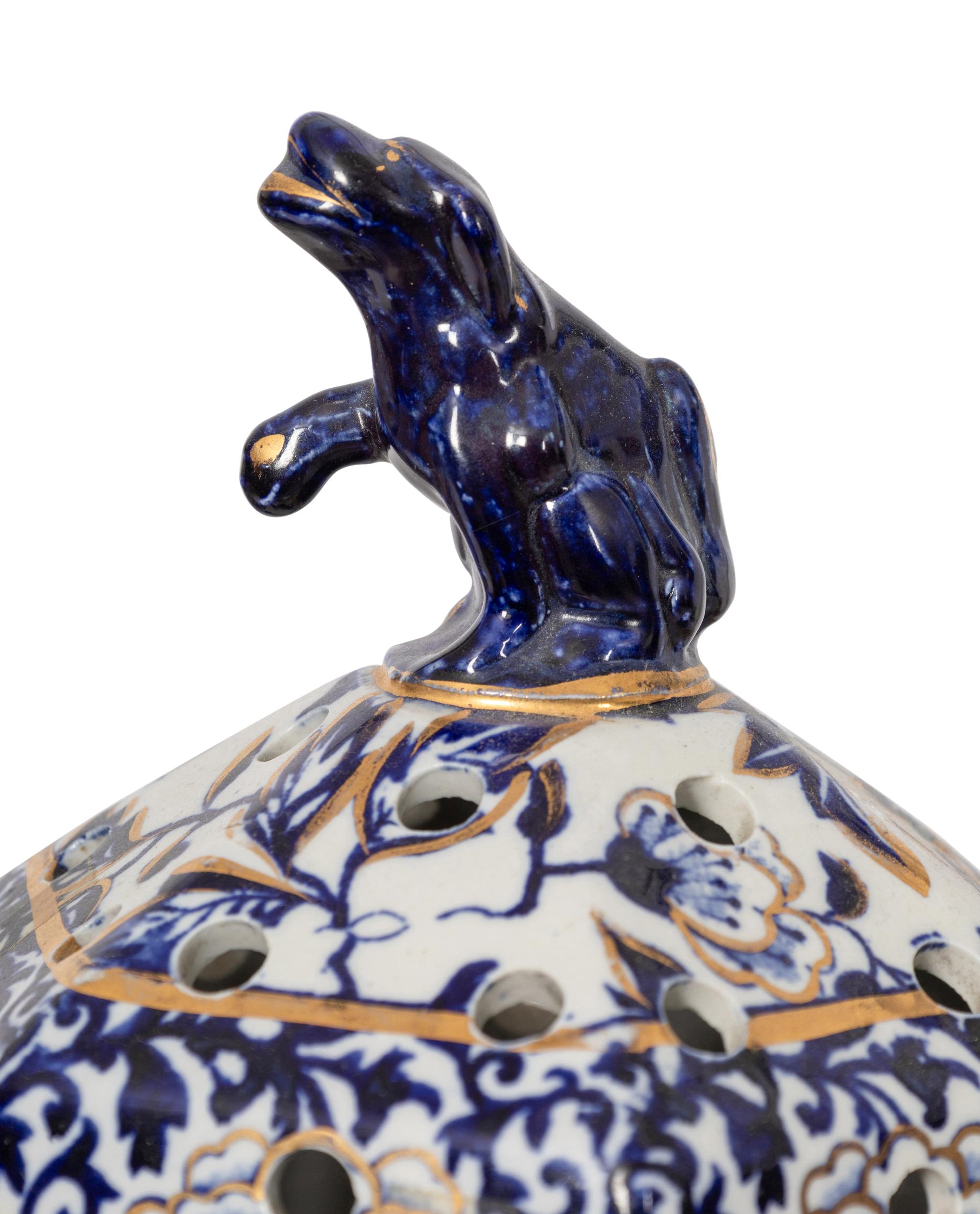A Pair of Large English Ironstone Parcel Gilt Blue and White Hexagonal Lidded Jars