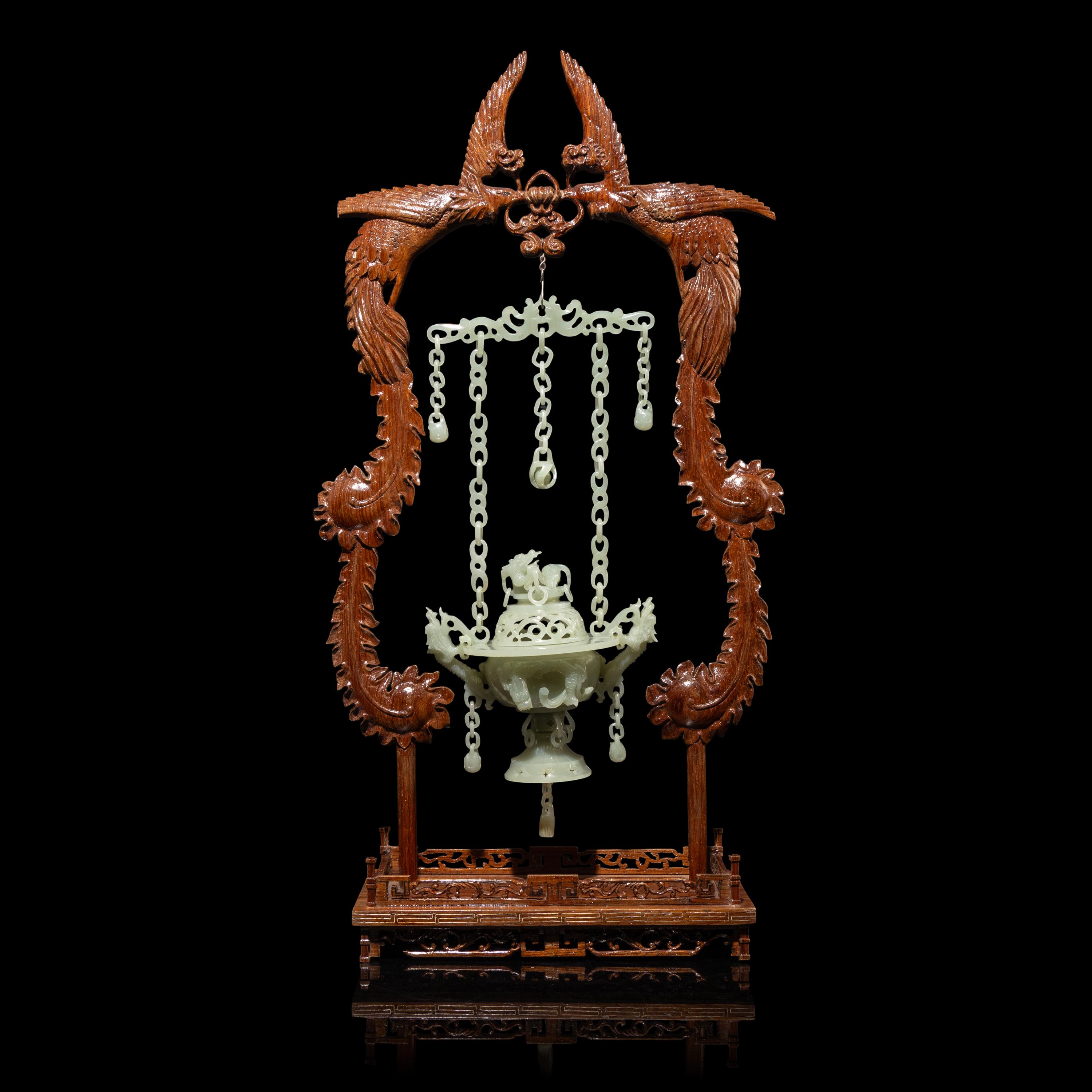 A Chinese Celadon Jade Hanging Incense Burner, 20th Century — 近代 青玉鏈式爐