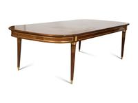 A Louis XVI Style Gilt Bronze Mounted Mahogany Dining Table
