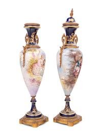 A Pair of Sèvres Style Gilt Metal Mounted Porcelain Urns