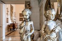 A Pair of Continental Giltwood Figures of Putti