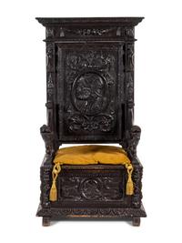 A Jacobean Carved Oak Hall Chair