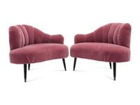 A Pair of Channel-Back Serpentine Lounge Chairs