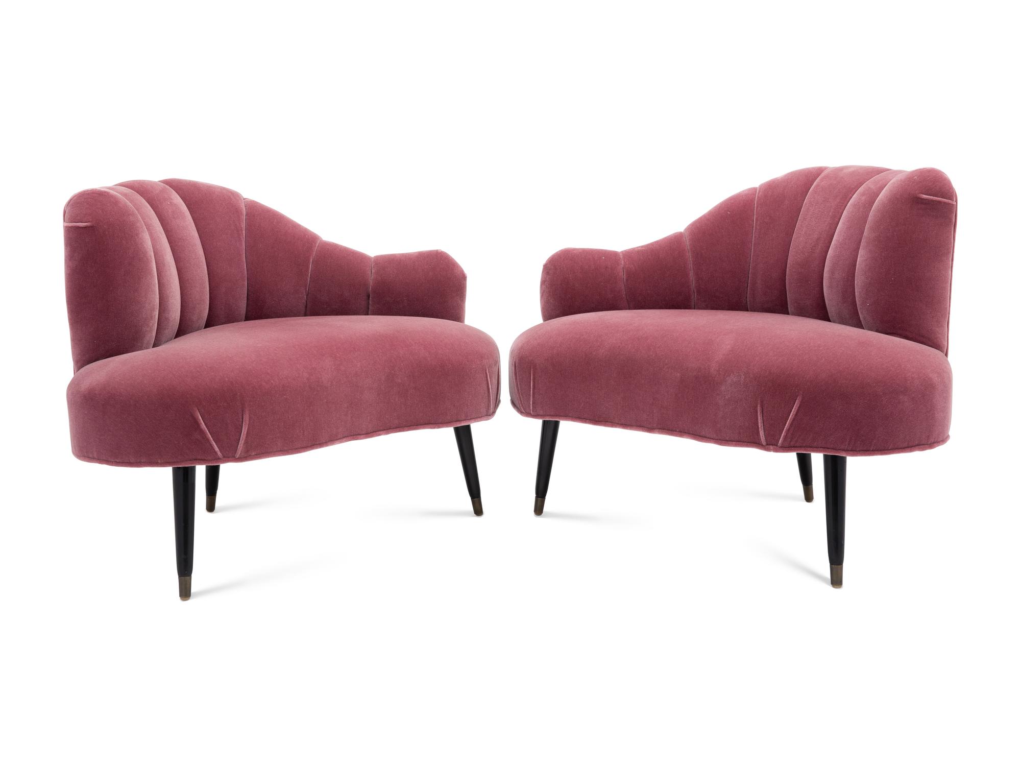 A Pair of Channel-Back Serpentine Lounge Chairs