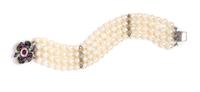 An 18 Karat White Gold, Sapphire, Ruby, Diamond and Cultured Pearl Multistrand Bracelet, 33.50 dwts.