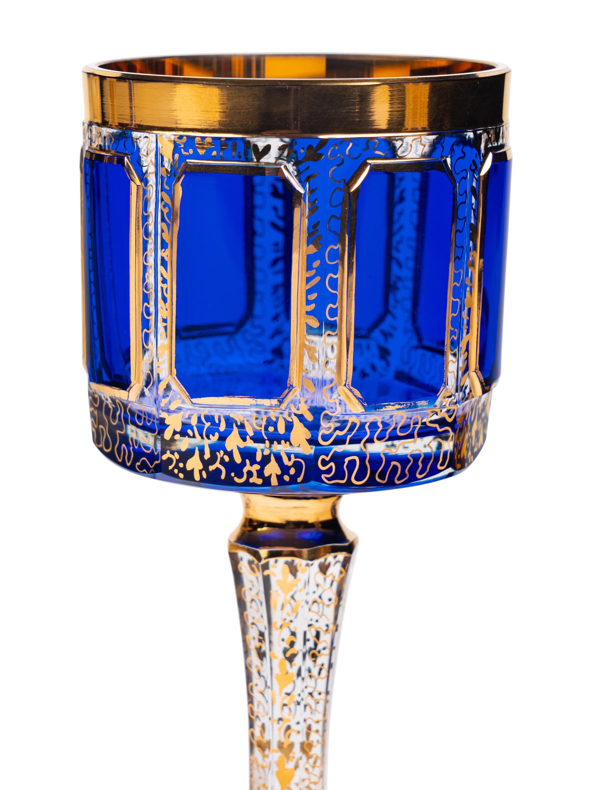 A Set of Moser Cobalt Blue and Gilt Decorated Glass Stemware