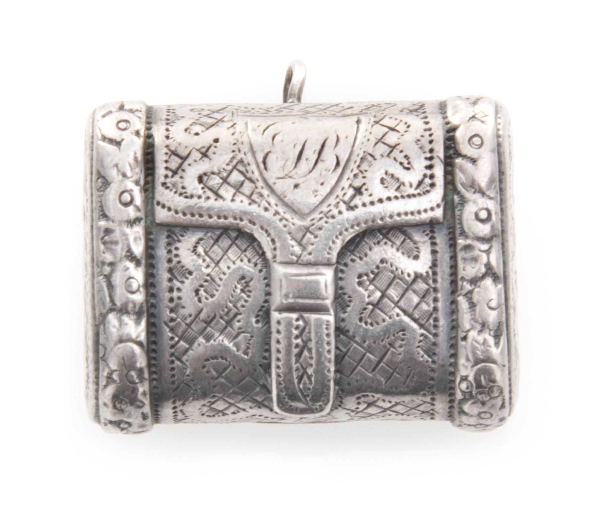 A George III Silver Vinaigrette, Likely John Shaw, Birmingham, 1793, the case worked to appear as a satchel with floral decorated borde
