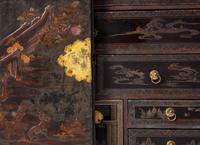A George III Parcel Gilt Japanned Cabinet on Stand