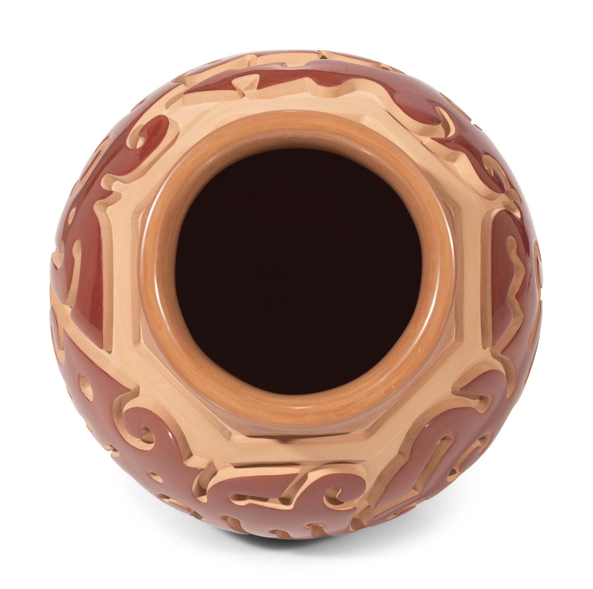 Red and Tan Carved Pottery Jar