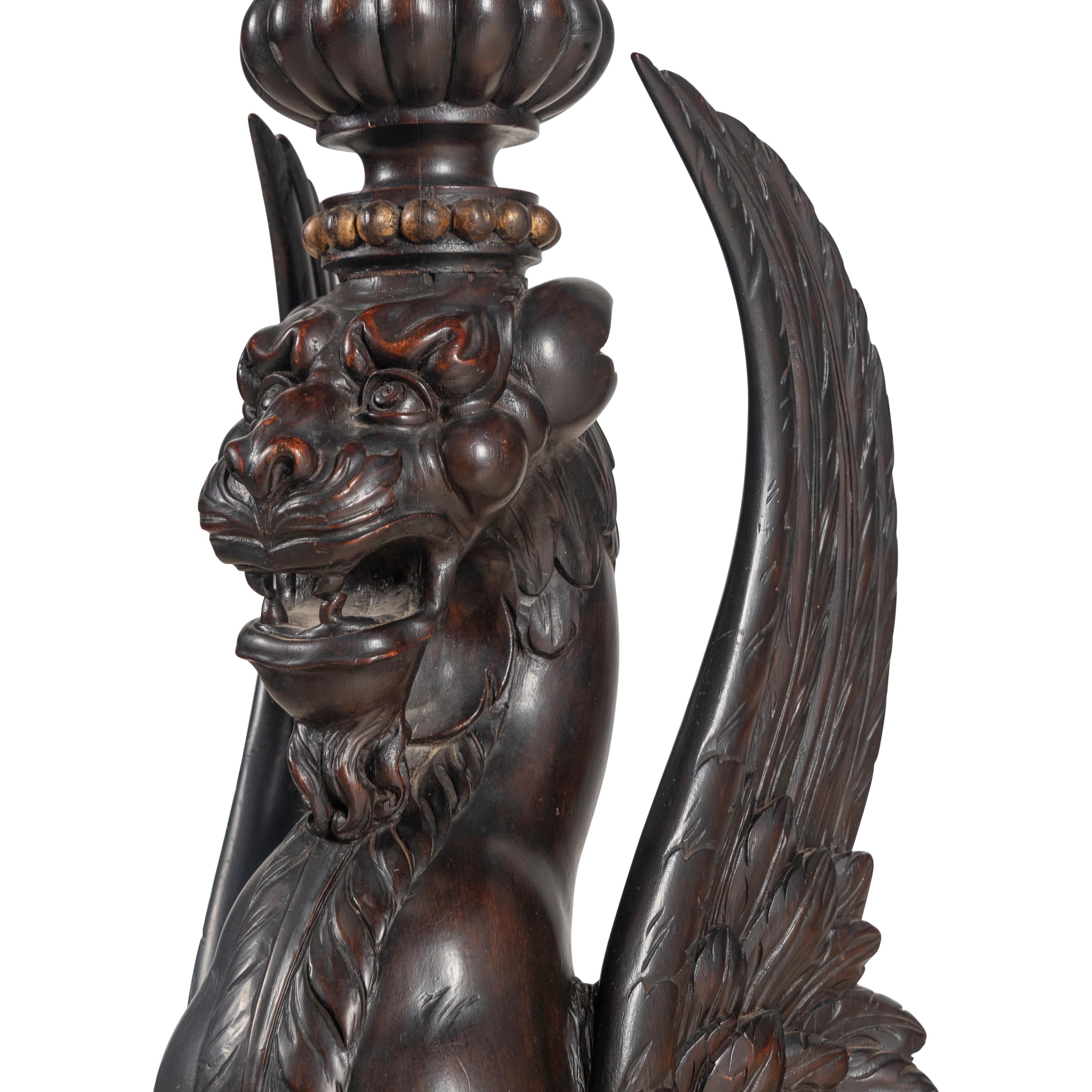 A Victorian Carved Walnut Griffin Pedestal