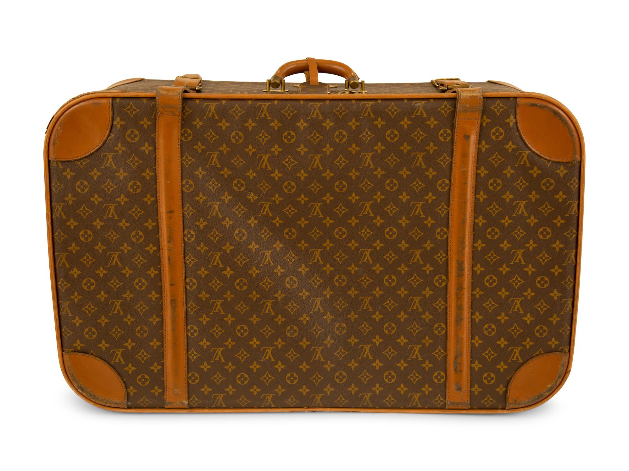Five Louis Vuitton Luggage Pieces