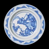 A Blue and White 'Landscape' Plate, Kangxi Period 清康熙 青花山水圖賞盤