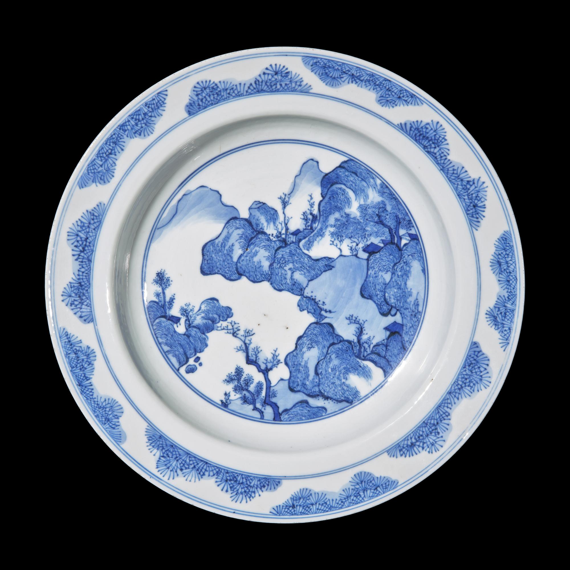 A Blue and White 'Landscape' Plate, Kangxi Period 清康熙 青花山水圖賞盤