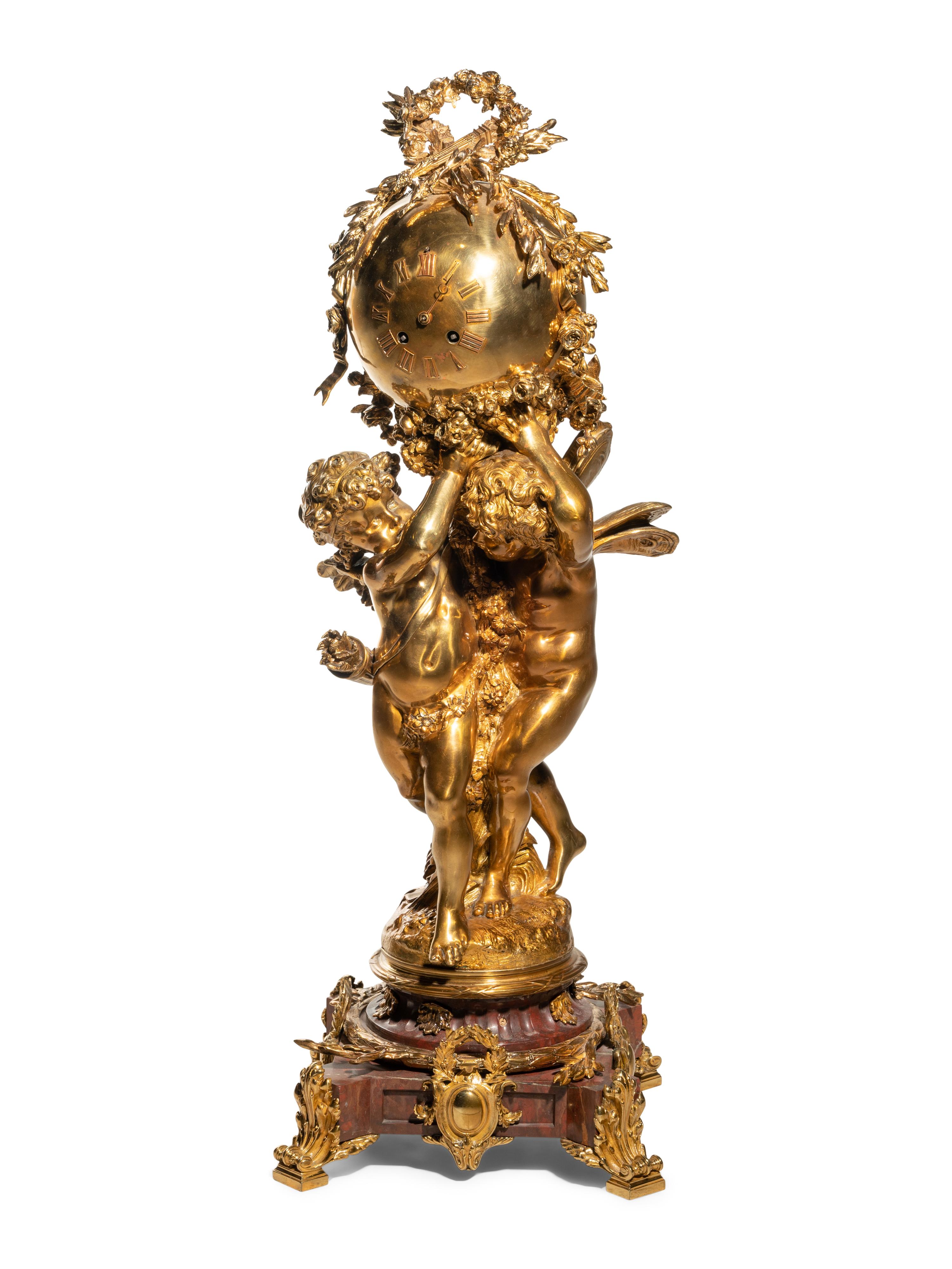 A French Gilt Bronze and Marble Figural Clock