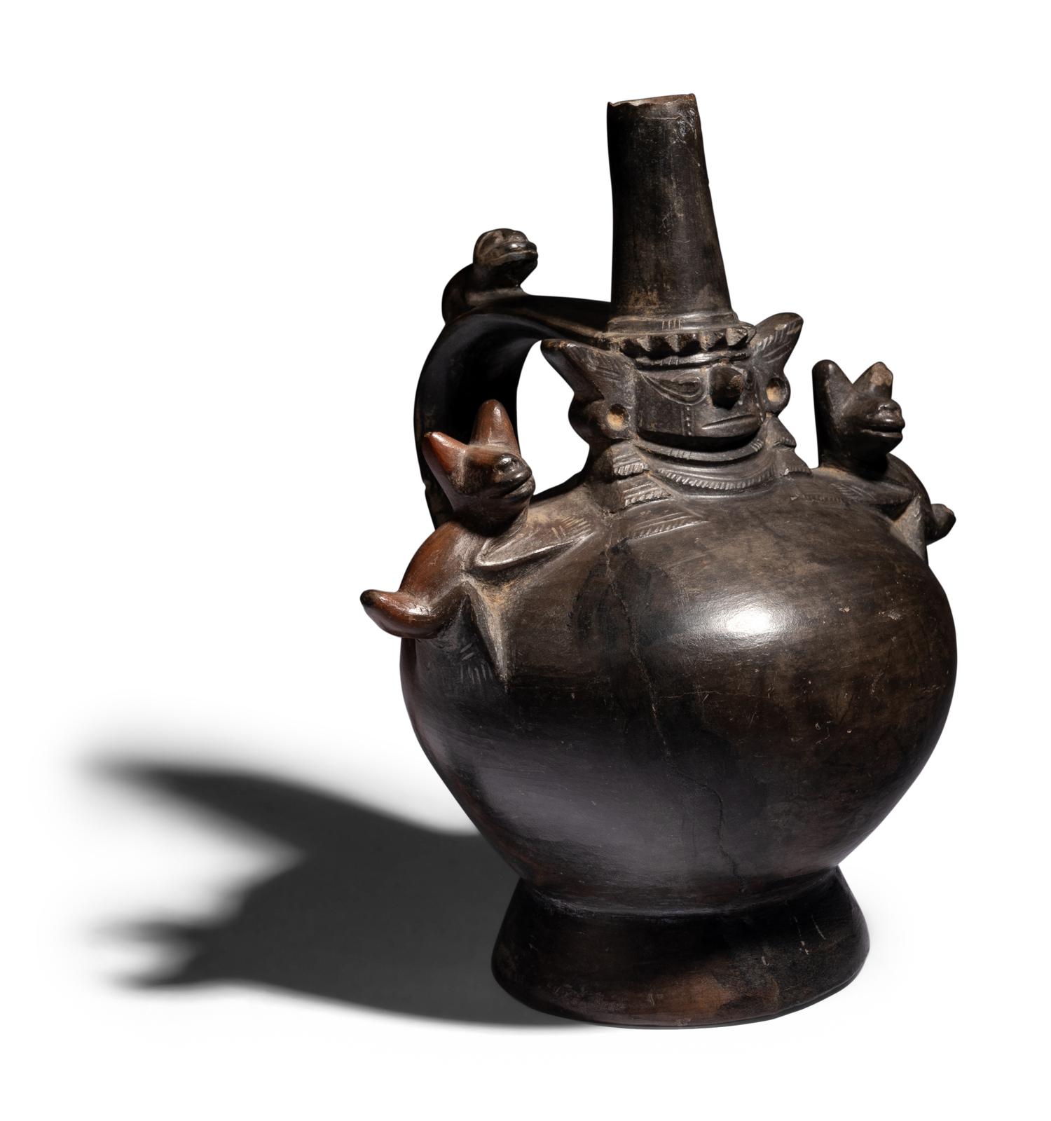 A Sican Blackware Stirrup Vessel