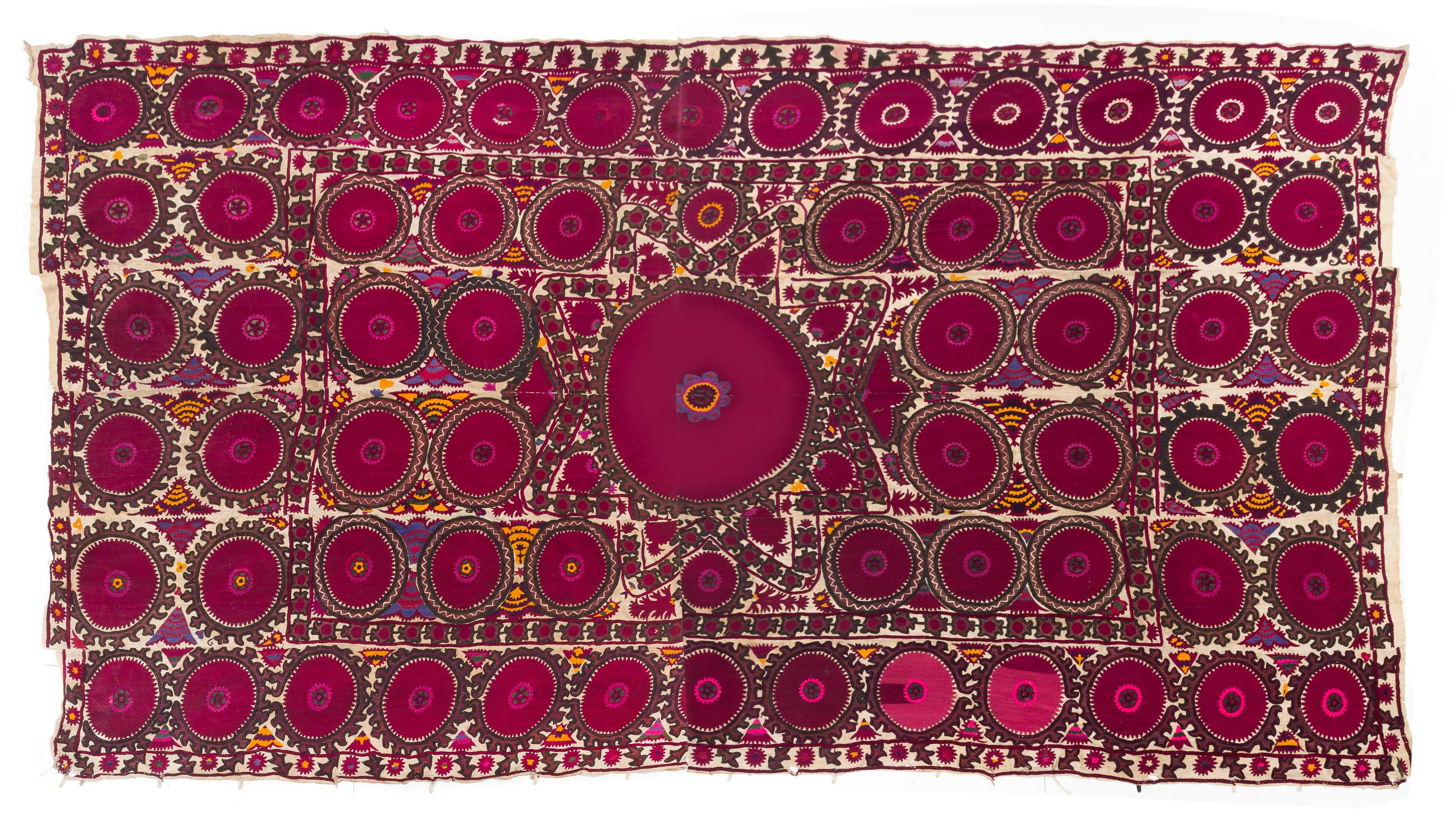 A Ura Tube Suzani Embroidery 14 feet 8 1/2 inches x 8 feet 11 5/8 inches. — EARLY 20TH CENTURY