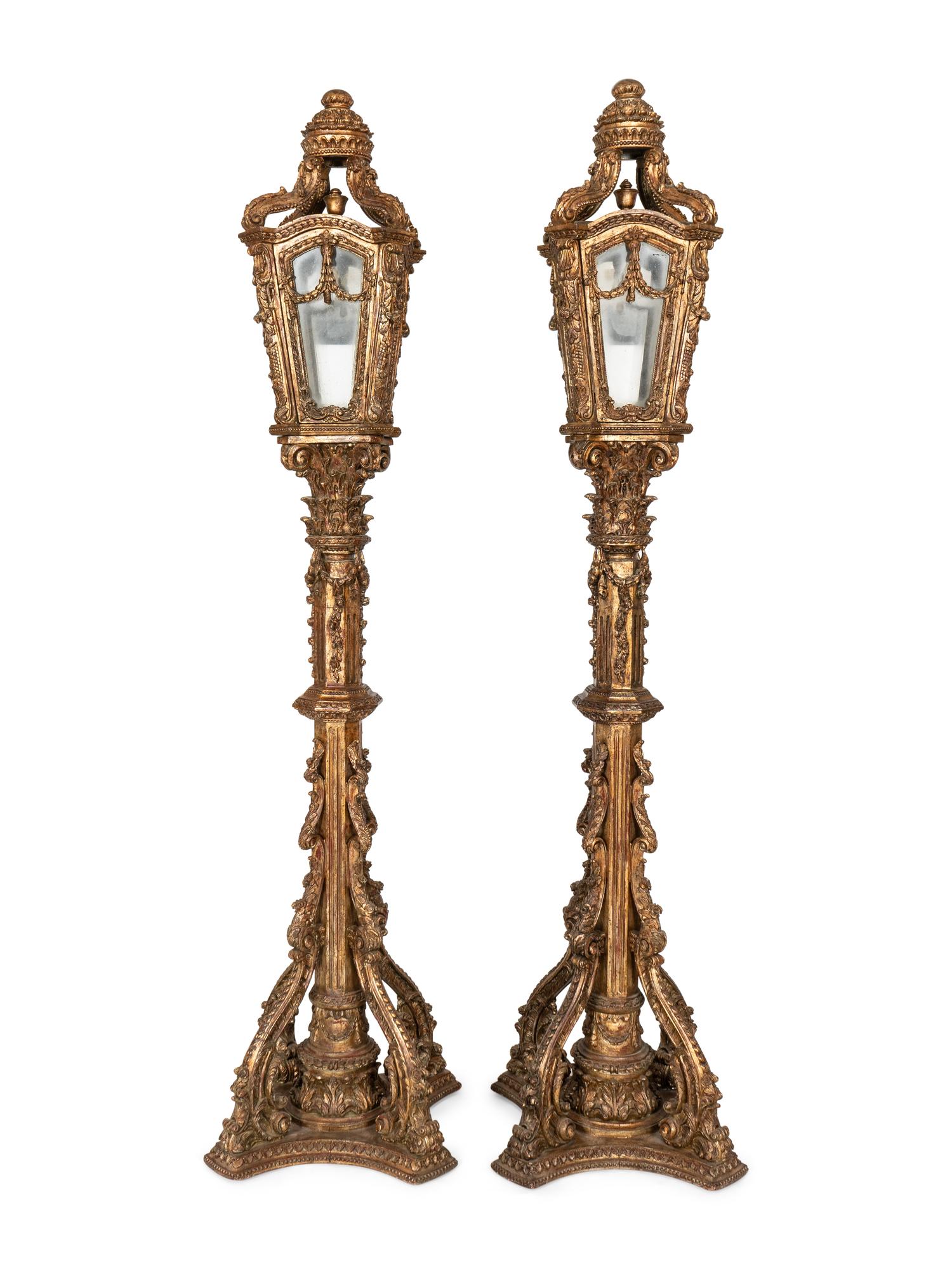 A Pair of Monumental Louis XV Style Elaborately Carved Giltwood Gondola Lanterns