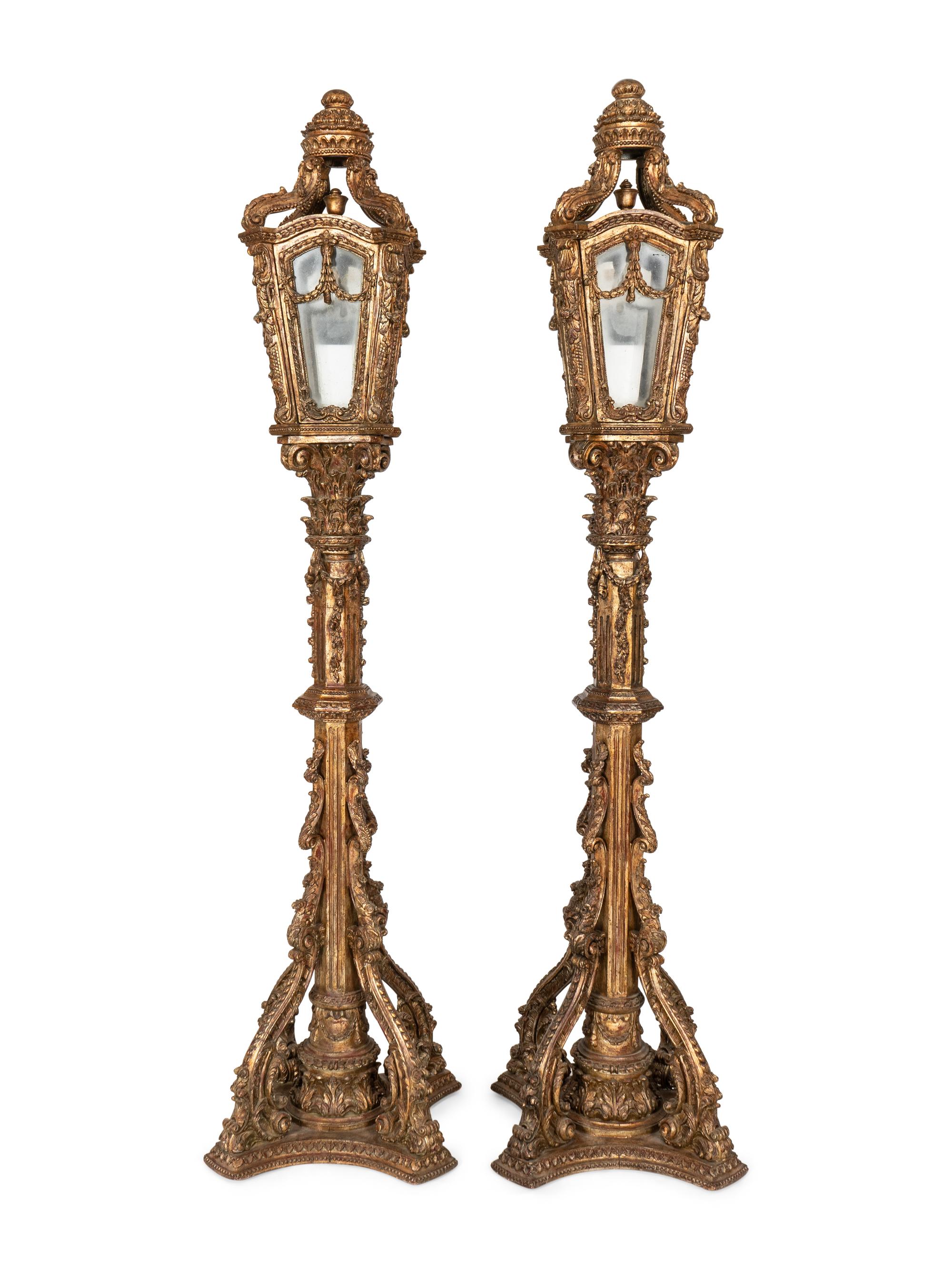 A Pair of Monumental Louis XV Style Elaborately Carved Giltwood Gondola Lanterns