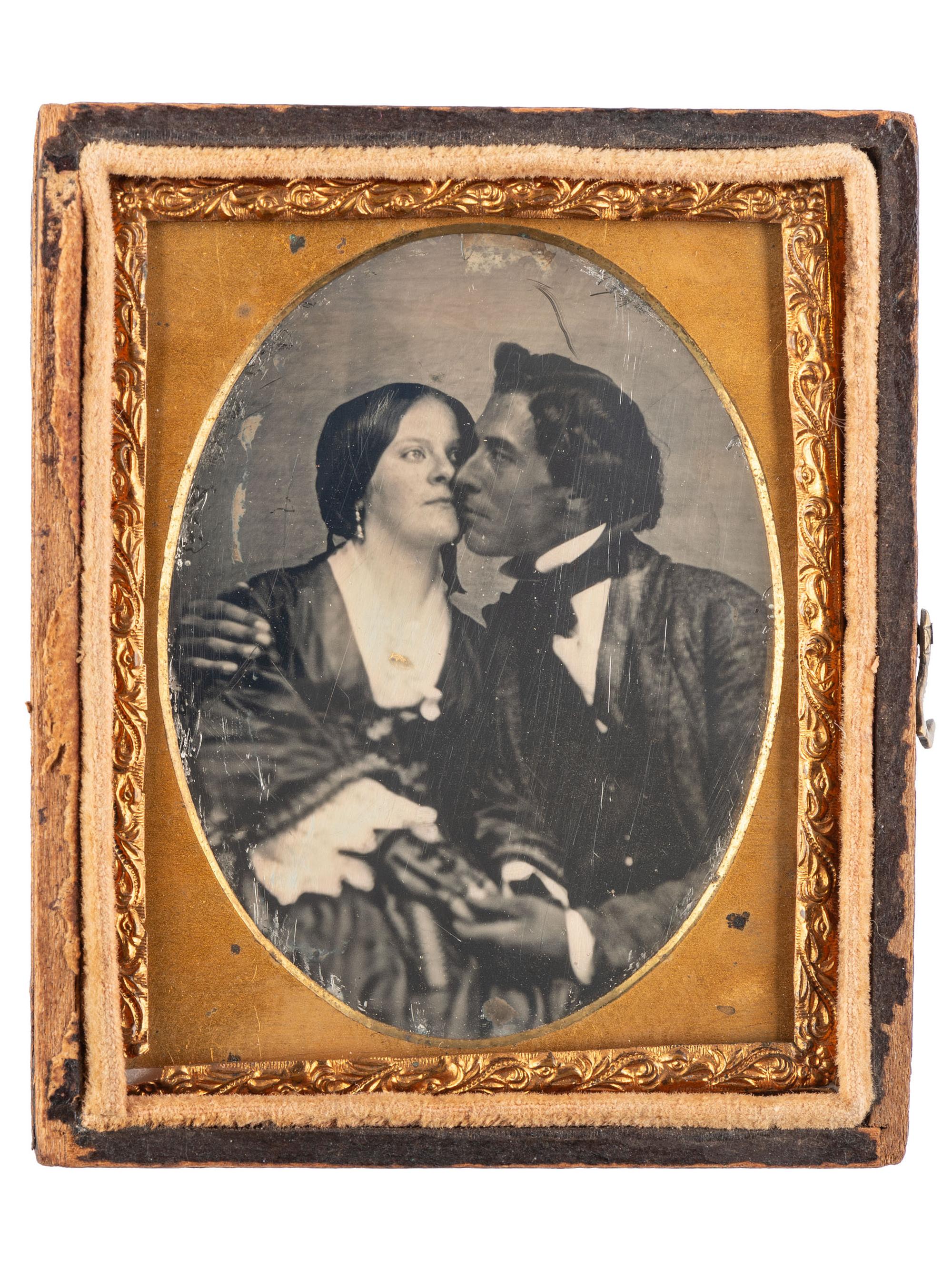 [EARLY PHOTOGRAPHY]. A remarkable ninth plate daguerreotype of an interracial couple.