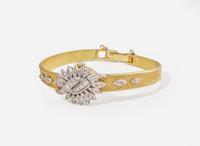 An 18K Yellow Gold and Diamond Hidden Dial Ladies Chopard Watch