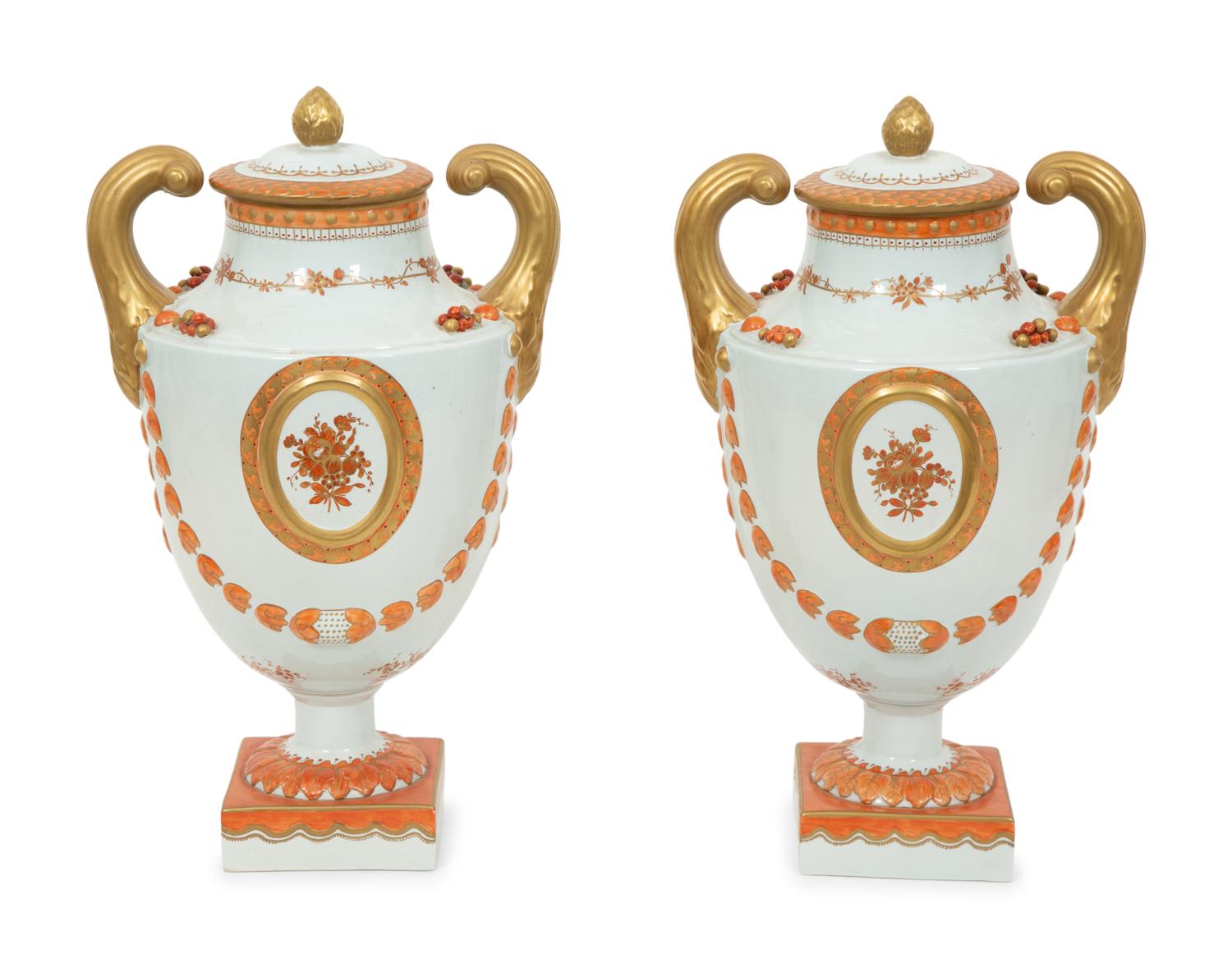 A Pair of Neoclassical Style Porcelain Urns with Bell Flower Swags