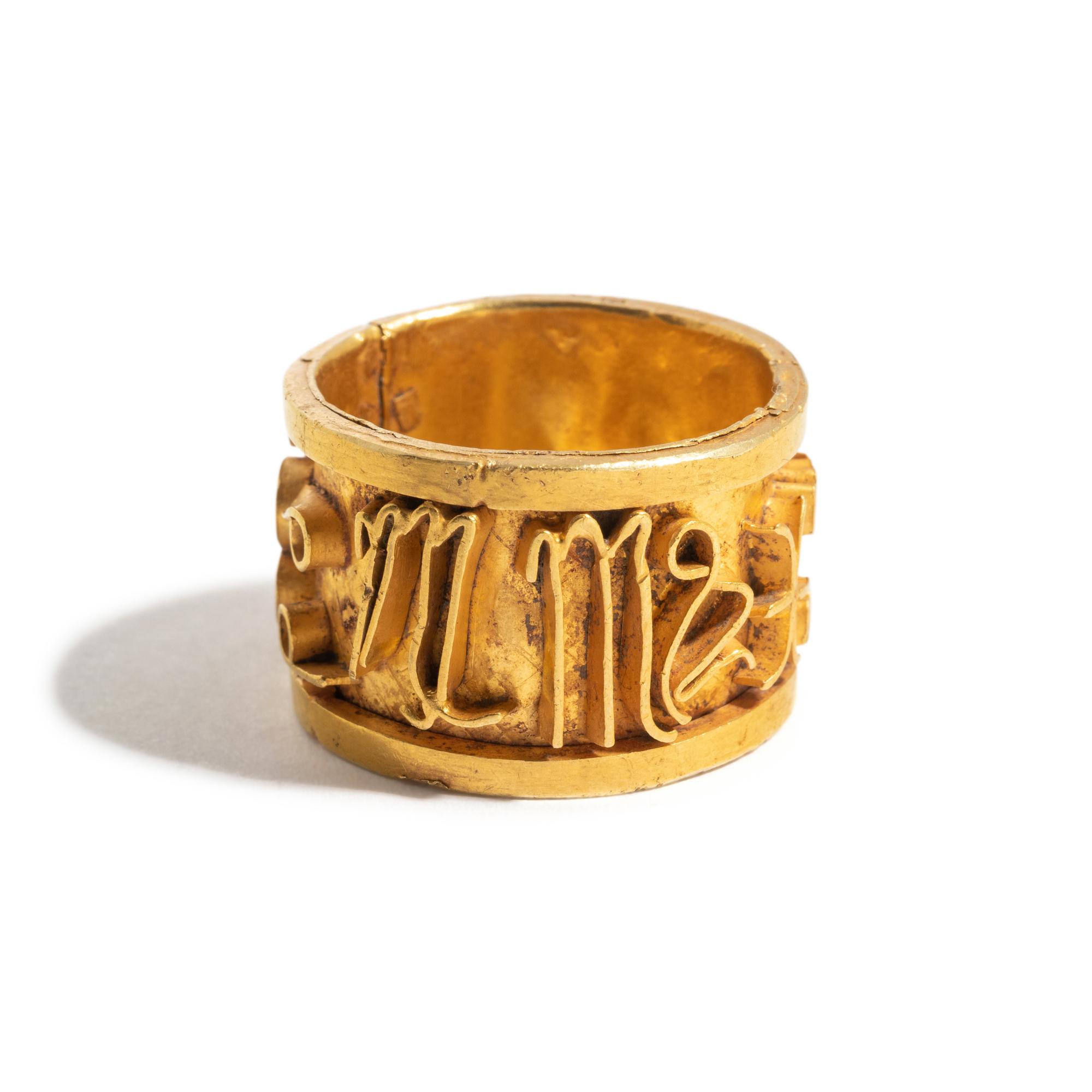 A Gold Zodiac Band Ring