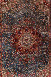 A Kirman Wool Rug