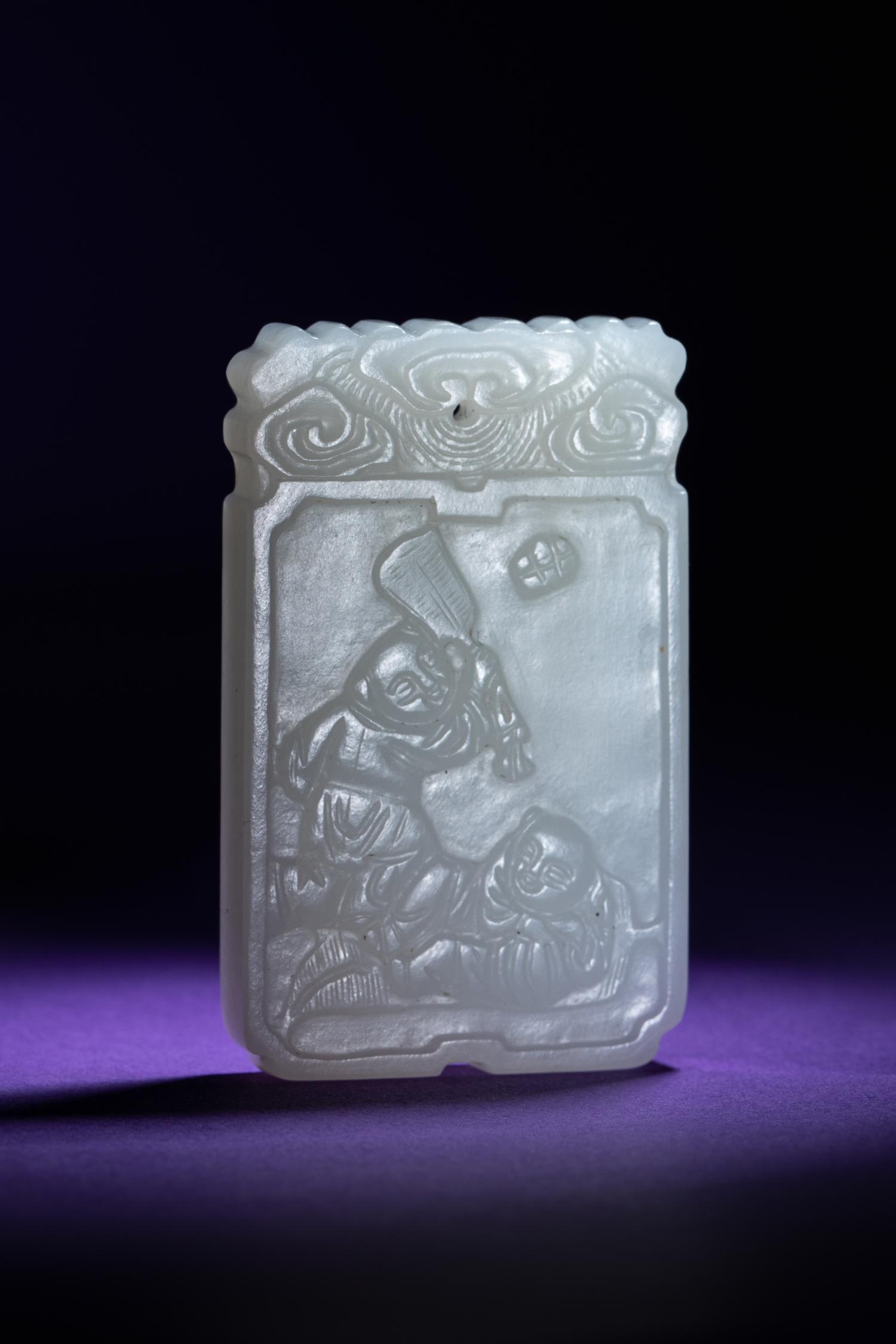 A Chinese White Jade 'Boys' Rectangular Pendant
