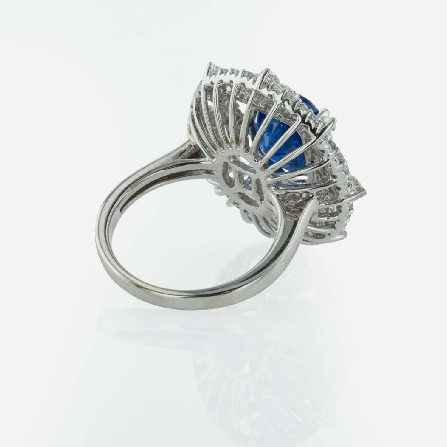 A 14K White Gold, Sapphire, and Diamond Ring